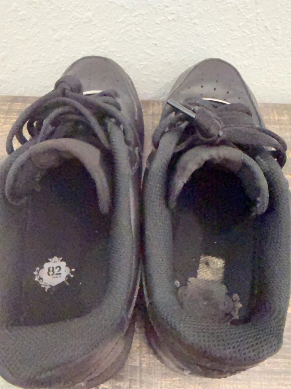 Nike Men's All-Black Leather Low-Top Sneakers